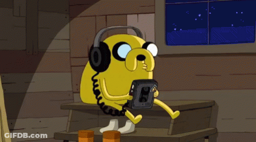 Cartoon Character Wearing Headphones Holding Cassette GIF
