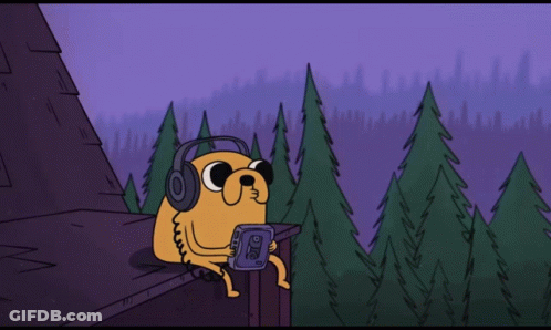 Cartoon Character Wearing Headphones Holding Tape Player GIF