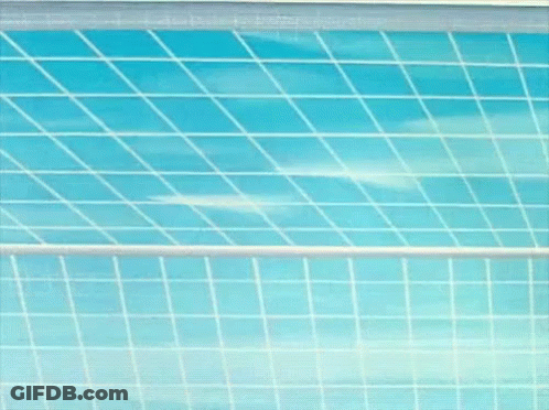 Cartoon Character Wearing Red Hat In Front Of Grid Wall GIF