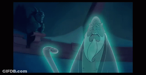 Cartoon Character With Beard Next To Gargoyle Statue GIF