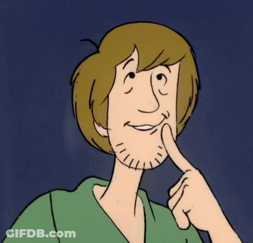 Cartoon Character With Beard Smiling And Pointing To Face GIF