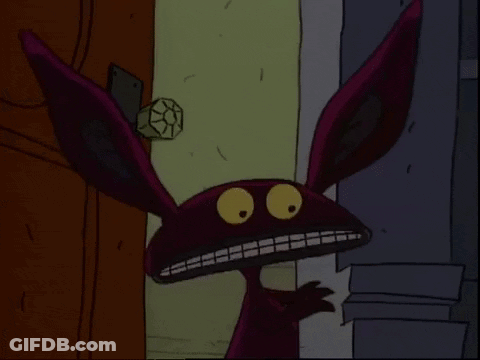 Cartoon Character With Big Ears Smiling GIF