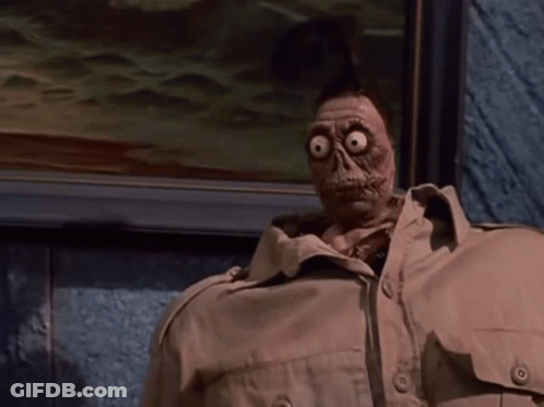 Cartoon Character With Big Eyes And Tan Jacket GIF