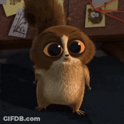 Cartoon Character With Big Orange Eyes GIF