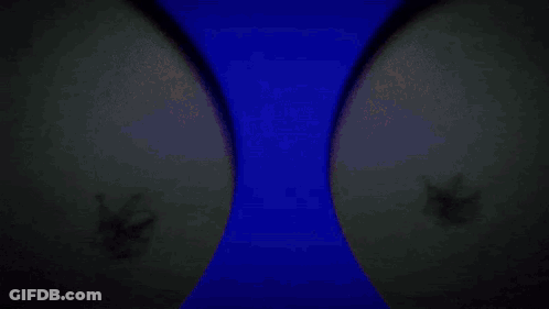 Cartoon Character With Big Smile Surrounded By Others GIF