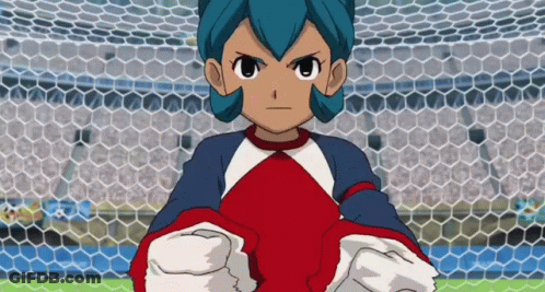 Cartoon Character With Blue Hair Standing In Front Of Goal GIF