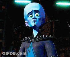 Cartoon Character With Blue Head And Green Eyes GIF
