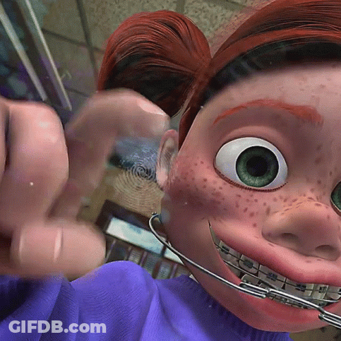 Cartoon Character With Braces And Freckles GIF