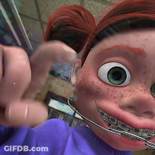 Cartoon Character With Braces And Freckles GIF