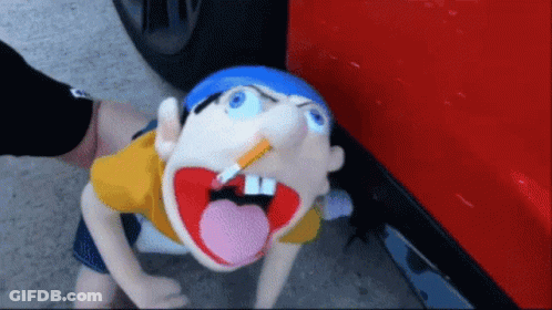 Cartoon Character With Cigarette Held By Person GIF