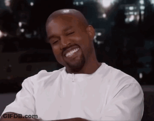 Cartoon Character With D Shirt Holding Smiley GIF