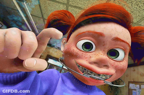 Cartoon Character With Freckles And Braces GIF