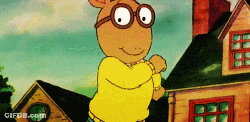 Cartoon Character With Glasses And Yellow Sweater GIF