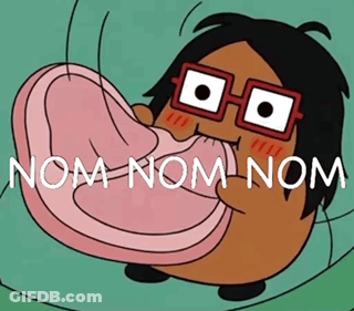 Cartoon Character With Glasses Eating Meat Saying Nom Nom Nom GIF