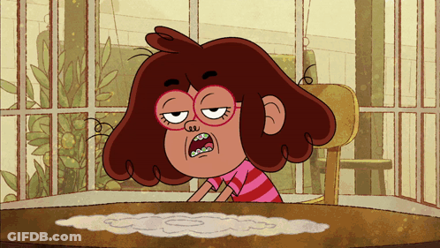 Cartoon Character With Glasses Sitting At Table Mouth Open GIF