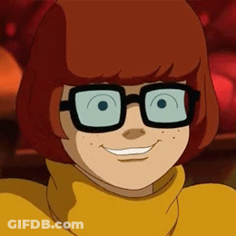 Cartoon Character With Glasses Smiling GIF