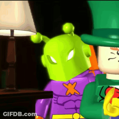 Cartoon Character With Green Head And Purple X GIF