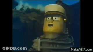 Cartoon Character With Hat Standing In Water Smiling GIF