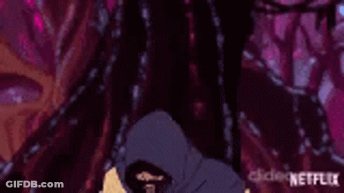 Cartoon Character With Hood Sitting On Throne In Cave GIF