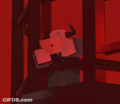 Cartoon Character With Horns In Dark Room With Cube GIF