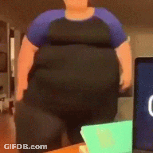 Cartoon Character With Large Belly In Front Of Laptop GIF