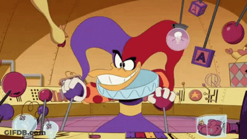 Cartoon Character With Purple Hat And Cube Letter A GIF