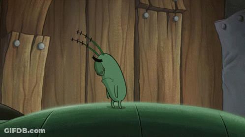Cartoon Character With Red Eye On Green Surface GIF
