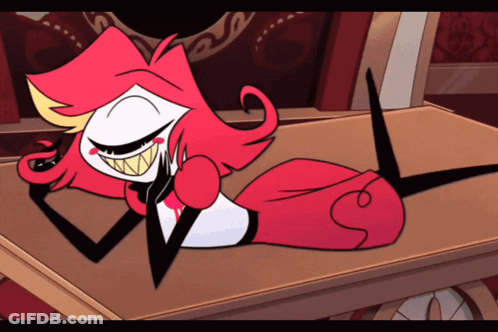 Cartoon Character With Red Hair And Big Teeth Laying On Table GIF