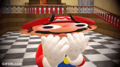 Cartoon Character With Red Hat And Horns Covering Face GIF