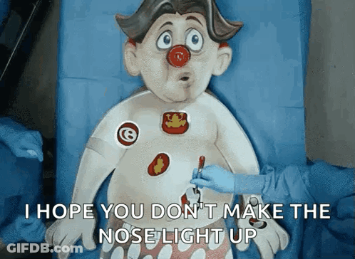Cartoon Character With Red Nose Being Operated GIF