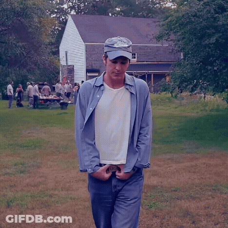 Cartoon Character With Smiley Face On Blue Shirt GIF