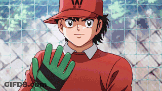 Cartoon Character With W Hat And Green Glove GIF