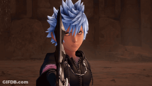Cartoon Character With Yellow Hair And Blue Eyes Smiling GIF