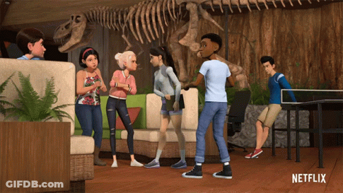 Cartoon Characters In Front Of T-Rex Skeleton With Netflix Logo GIF