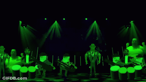 Cartoon Characters Playing Instruments On Stage GIF