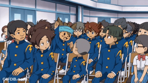 Cartoon Characters Raising Fist In Classroom GIF