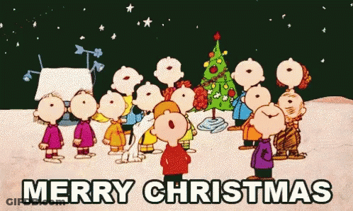 Cartoon Characters Singing Merry Christmas In Front Of Christmas Tree GIF
