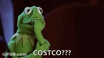 Cartoon Characters Sitting Around Table Saying One Of Us GIF