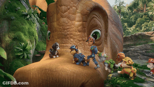 Cartoon Characters Standing Around Large Dinosaur Head GIF