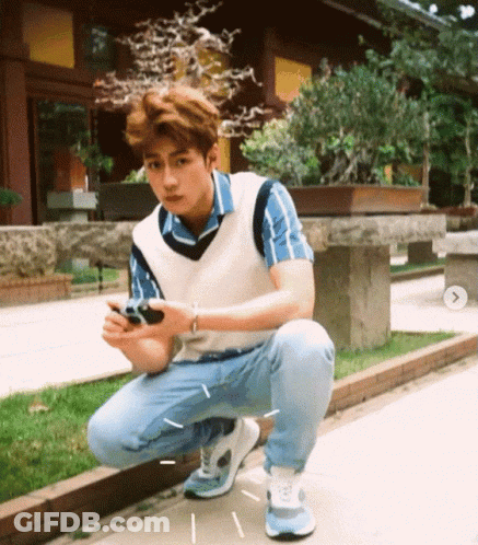 Cartoon Characters Standing On Sidewalk GIF