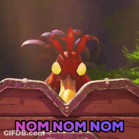 Cartoon Chicken Peeking Out Of Treasure Chest Saying Nom Nom Nom GIF