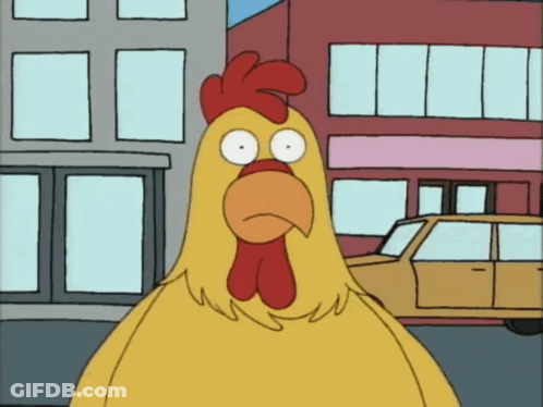 Cartoon Chicken Standing In Front Of Buildings GIF