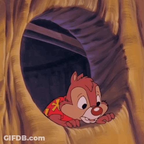 Cartoon Chipmunk In Red X Shirt Peeking Out Of Tree Hole GIF
