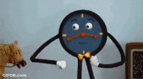 Cartoon Clock Standing Next To Stuffed Animal GIF