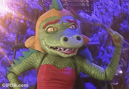 Cartoon Crocodile In Red Dress Waving GIF