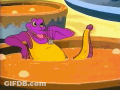 Cartoon Crocodile Sitting In Bowl Of Orange Liquid GIF