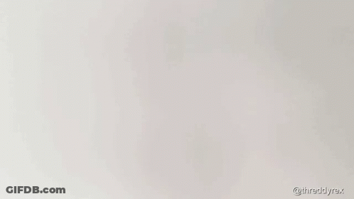 Cartoon Dinosaur Saying Beans GIF