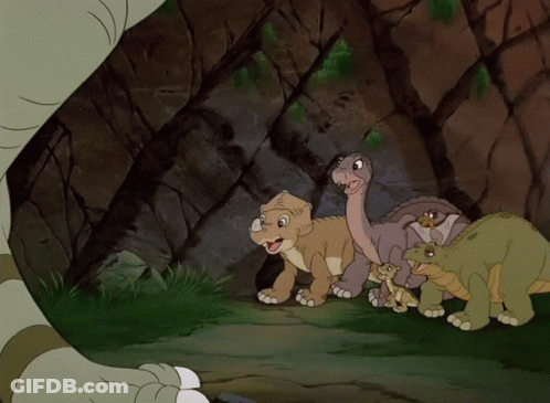 Cartoon Dinosaurs In A Cave GIF