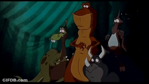 Cartoon Dinosaurs Standing Together In Dark Room GIF