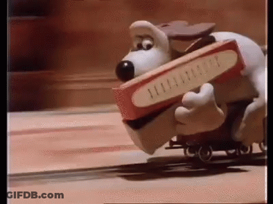 Cartoon Dog Carrying Box On Train GIF